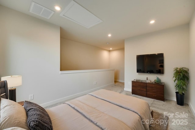 bedroom with attic access, light carpet, baseboards, and recessed lighting