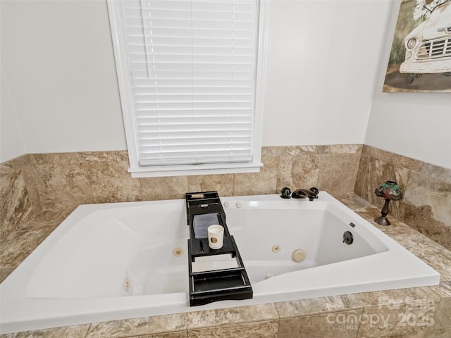 full bath featuring a whirlpool tub