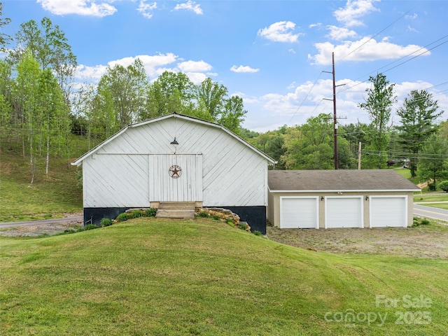 view of outbuilding featuring entry steps