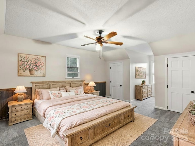 2581 Double Island Rd, Green Mountain, NC 28740 - carpeted bedroom with a textured ceiling, lofted ceiling, and a ceiling fan