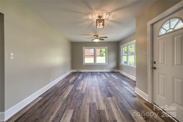 417 Mountain View Ave SE, Valdese, NC 28690 - foyer with ceiling fan, dark wood-style floors, and baseboards