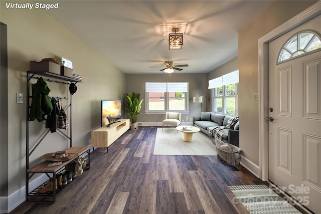 417 Mountain View Ave SE, Valdese, NC 28690 - living area featuring dark wood-style flooring, a ceiling fan, and baseboards