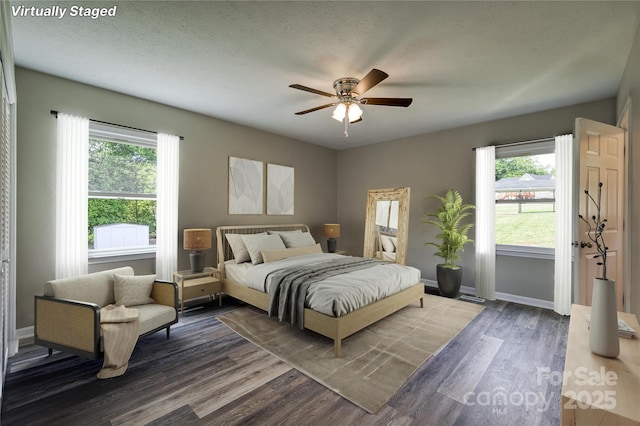 417 Mountain View Ave SE, Valdese, NC 28690 - bedroom with wood finished floors, baseboards, and a ceiling fan
