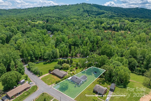 417 Mountain View Ave SE, Valdese, NC 28690 - aerial view of property's location featuring a heavily wooded area and property boundaries highlighted