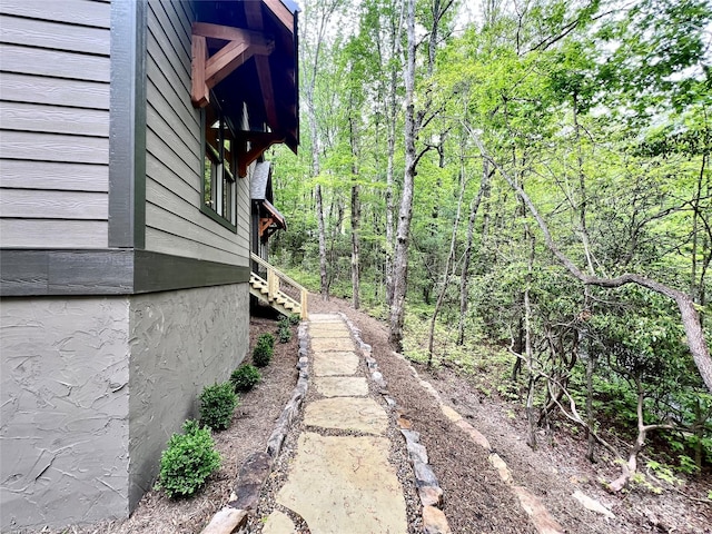 view of yard featuring stairs
