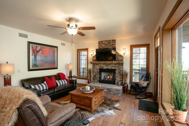 81 Creekside Way Unit F/101, Burnsville, NC 28714 - living room featuring hardwood / wood-style floors, ceiling fan, a fireplace, and baseboards