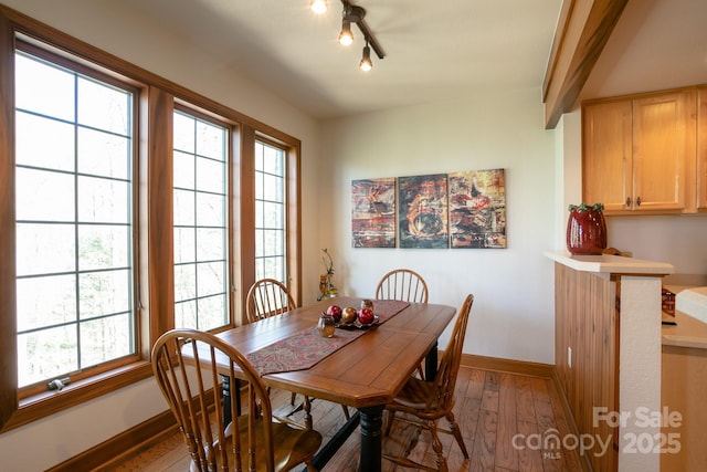 81 Creekside Way Unit F/101, Burnsville, NC 28714 - dining room with wood-type flooring and baseboards