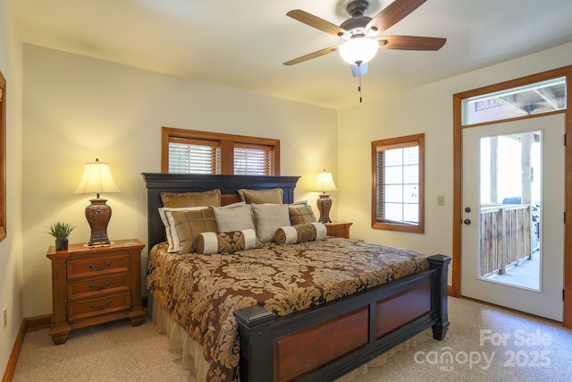 81 Creekside Way Unit F/101, Burnsville, NC 28714 - bedroom with access to exterior, light carpet, baseboards, and ceiling fan