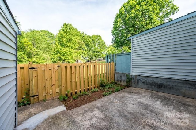 view of patio with fence