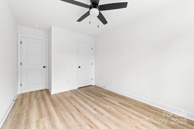 424 Airline Ave, Shelby, NC 28150 - unfurnished bedroom featuring light wood-style floors, baseboards, and ceiling fan