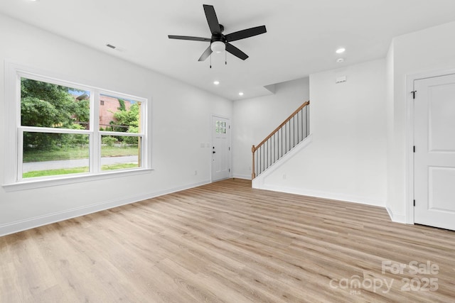 424 Airline Ave, Shelby, NC 28150 - unfurnished living room with stairway, light wood finished floors, a ceiling fan, recessed lighting, and baseboards