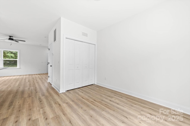 424 Airline Ave, Shelby, NC 28150 - empty room featuring light wood-style floors, a ceiling fan, and baseboards