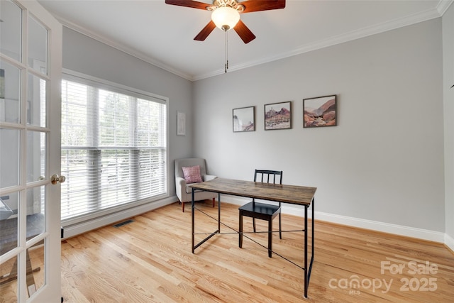 office with wood finished floors, baseboards, ornamental molding, a ceiling fan, and french doors