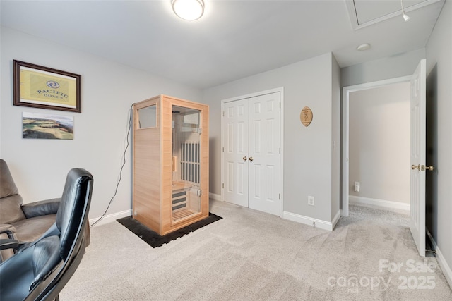 office space featuring carpet floors and baseboards