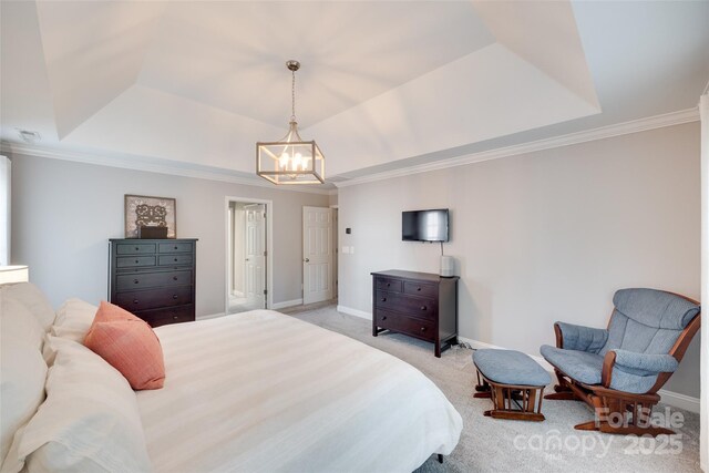 bedroom with a chandelier, a raised ceiling, light colored carpet, baseboards, and crown molding