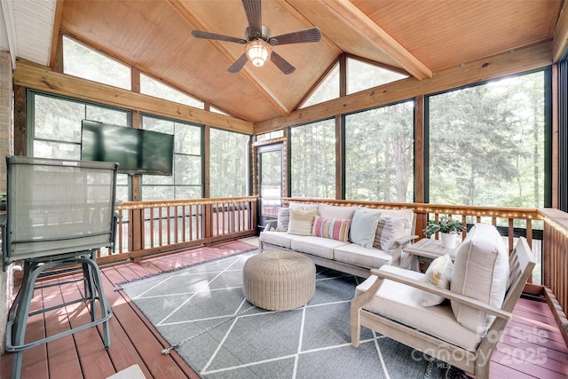 sunroom with ceiling fan and an outdoor hangout area
