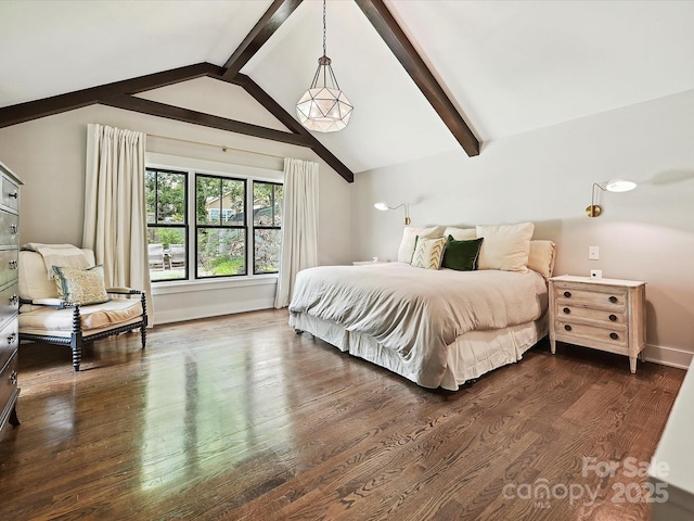 bedroom with dark wood finished floors and baseboards