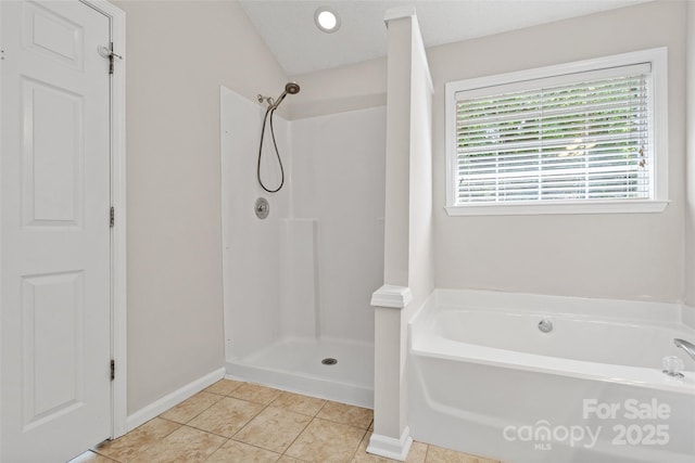 6434 Skyline Dr, Charlotte, NC 28269 - full bathroom with a garden tub, baseboards, tile patterned floors, and a shower