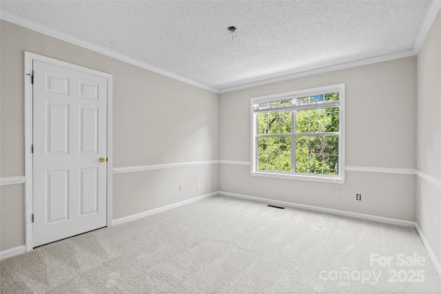 6434 Skyline Dr, Charlotte, NC 28269 - carpeted spare room featuring a textured ceiling, baseboards, and crown molding