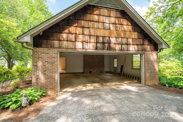 104 Ridge Dr, Stanley, NC 28164 - view of front of property featuring brick siding and a detached garage