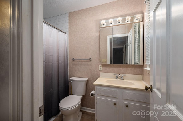 104 Ridge Dr, Stanley, NC 28164 - bathroom with vanity, toilet, a shower with shower curtain, and a textured ceiling