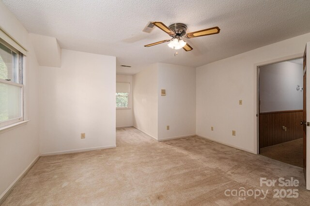 104 Ridge Dr, Stanley, NC 28164 - carpeted spare room with ceiling fan and a textured ceiling