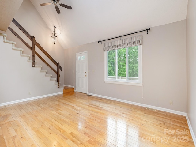55 Willow Bnd, Hendersonville, NC 28792 - entryway with stairway, hardwood / wood-style floors, a ceiling fan, baseboards, and high vaulted ceiling