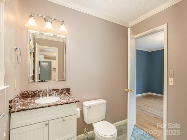55 Willow Bnd, Hendersonville, NC 28792 - bathroom featuring toilet, vanity, a textured ceiling, baseboards, and tile patterned flooring