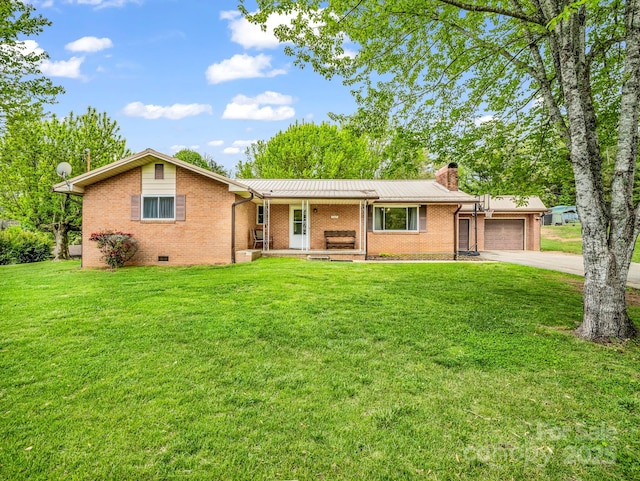 ranch-style home featuring a porch, an attached garage, brick siding, a chimney, and driveway