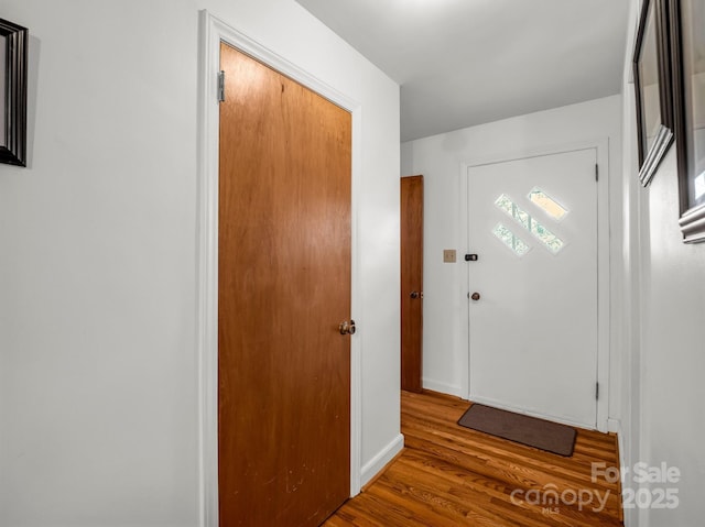 foyer with wood finished floors