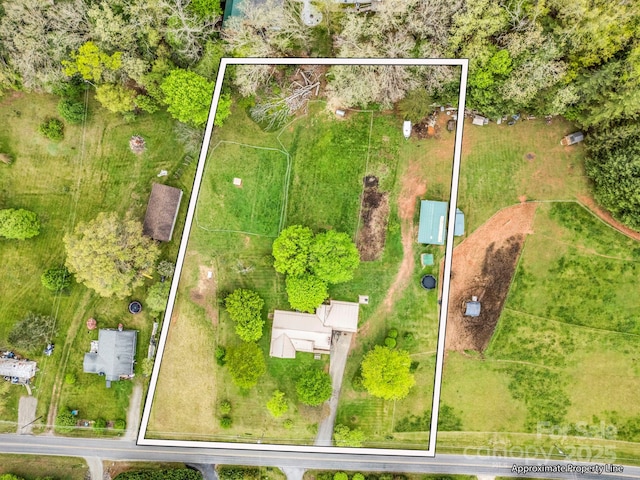 aerial view of property's location featuring property parcel outlined