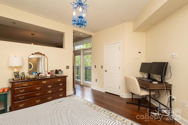 1320 Fillmore Ave Unit 426, Charlotte, NC 28203 - bedroom featuring access to outside, dark wood-type flooring, a chandelier, baseboards, and electric panel