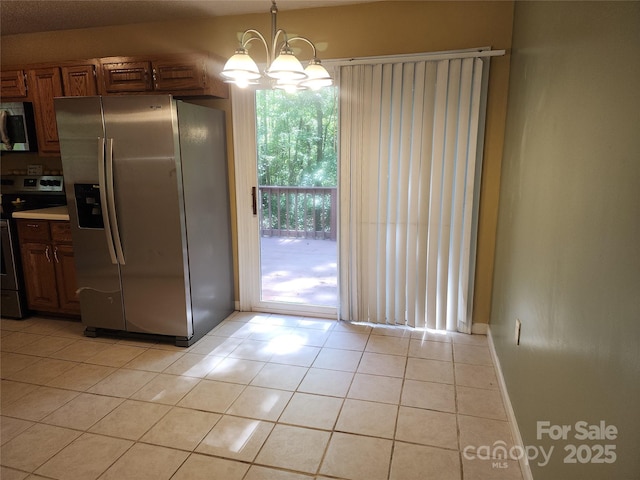 4409 Homestead Rd, Rock Hill, SC 29732 - interior space with a chandelier and light tile patterned flooring