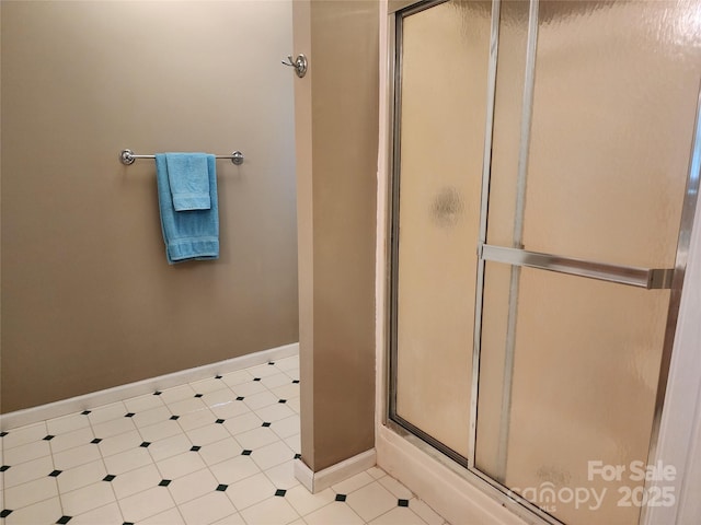4409 Homestead Rd, Rock Hill, SC 29732 - bathroom with tile patterned floors, baseboards, and a shower stall
