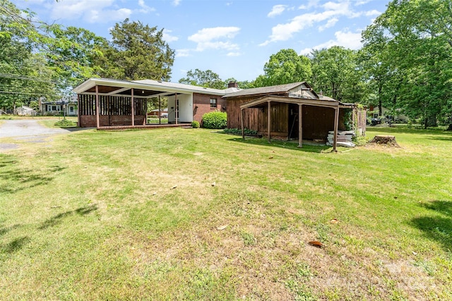 1102 E 13th St, Kannapolis, NC 28083 - back of property with a lawn and a chimney