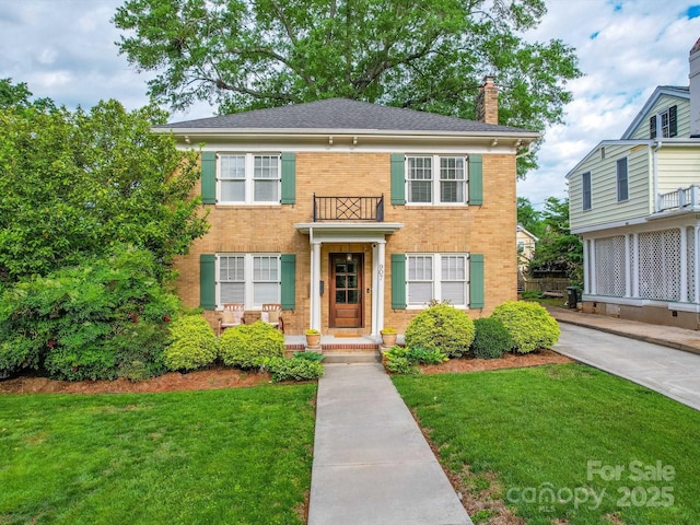 907 Edgewood Cir, Gastonia, NC 28052 - view of front of property featuring a chimney, brick siding, and a front lawn