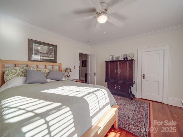 907 Edgewood Cir, Gastonia, NC 28052 - bedroom with ornamental molding, wood finished floors, and ceiling fan