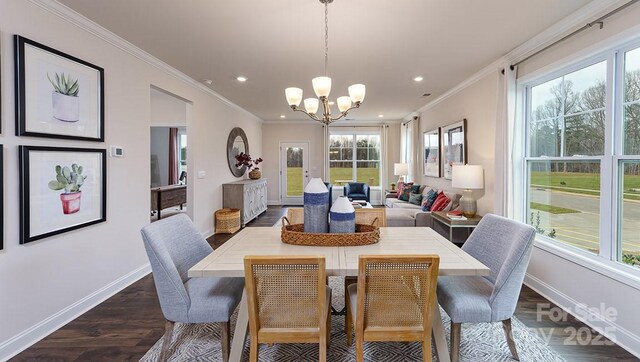 dining area featuring baseboards, dark wood-type flooring, recessed lighting, and a chandelier