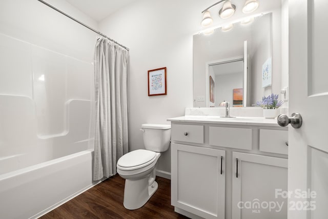 31 Cherry Laurel Ln, Swannanoa, NC 28778 - full bath featuring toilet, baseboards, shower / tub combo with curtain, vanity, and wood finished floors