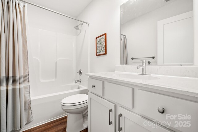 31 Cherry Laurel Ln, Swannanoa, NC 28778 - bathroom with vanity, toilet, shower / tub combo, and wood finished floors