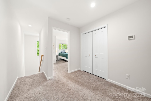 31 Cherry Laurel Ln, Swannanoa, NC 28778 - unfurnished bedroom featuring carpet floors, baseboards, a closet, and recessed lighting