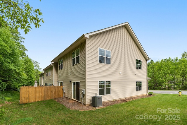 31 Cherry Laurel Ln, Swannanoa, NC 28778 - back of property with central AC, fence, and a lawn