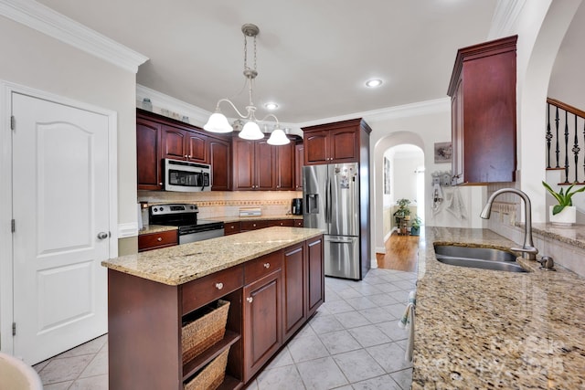 3610 Providence Mill Rd, Maiden, NC 28650 - kitchen with appliances with stainless steel finishes, arched walkways, a sink, crown molding, and decorative backsplash