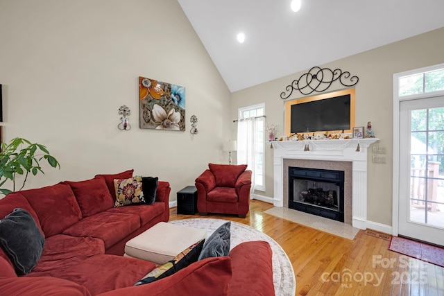 3610 Providence Mill Rd, Maiden, NC 28650 - living room with wood finished floors, high vaulted ceiling, a fireplace with flush hearth, baseboards, and recessed lighting