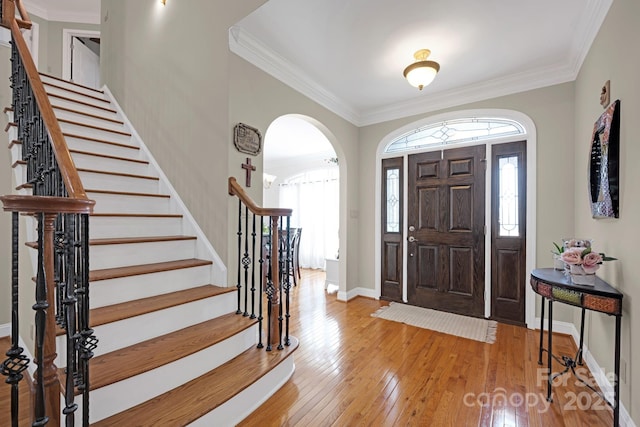 3610 Providence Mill Rd, Maiden, NC 28650 - foyer entrance featuring stairs, light wood-style flooring, ornamental molding, arched walkways, and baseboards