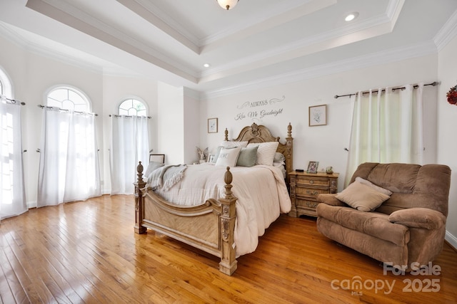 3610 Providence Mill Rd, Maiden, NC 28650 - bedroom featuring a raised ceiling, light wood-style flooring, and ornamental molding