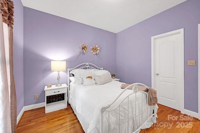 3610 Providence Mill Rd, Maiden, NC 28650 - bedroom with baseboards and wood finished floors