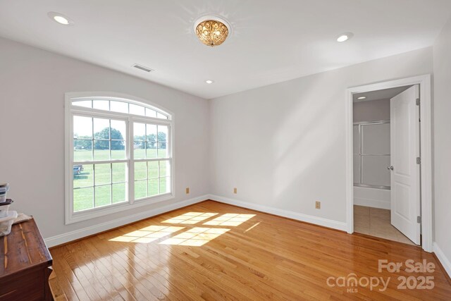 3610 Providence Mill Rd, Maiden, NC 28650 - unfurnished bedroom with light wood finished floors, baseboards, and recessed lighting