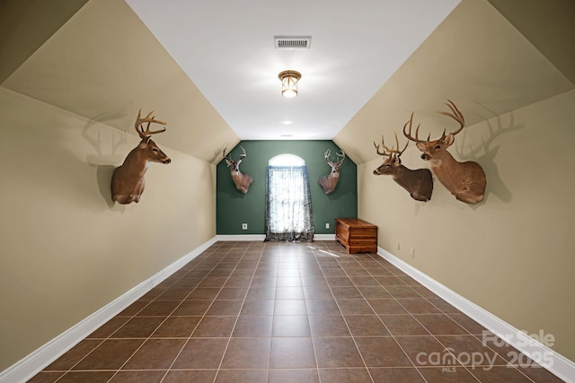 3610 Providence Mill Rd, Maiden, NC 28650 - additional living space featuring vaulted ceiling, dark tile patterned floors, and baseboards