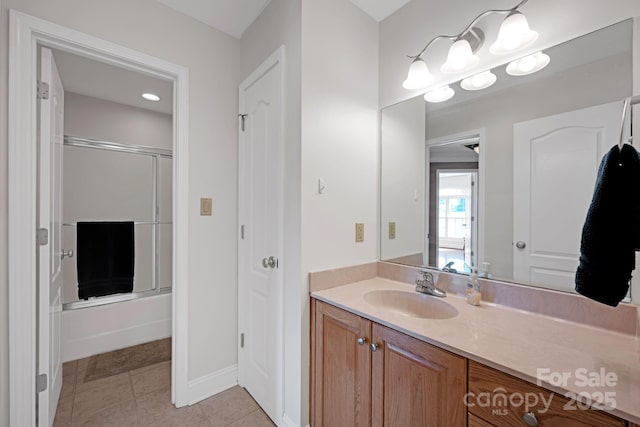 3610 Providence Mill Rd, Maiden, NC 28650 - full bathroom with vanity, tile patterned flooring, bath / shower combo with glass door, and baseboards